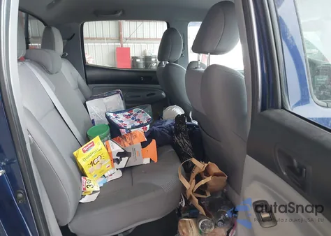 2014 Toyota Tacoma Base V6 z USA, uszkodzony, nr VIN 3TMLU4ENXEM151963